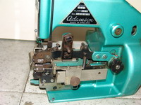 Máquina de coser adamson